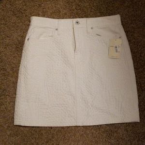 White cotton Lucky mini skirt.